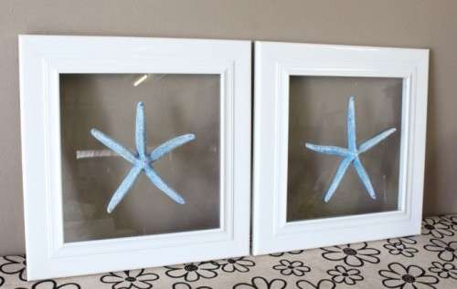 A fabulous set of real "Starfish" on a glass panel in a white frame. Stunning in all homes!!
