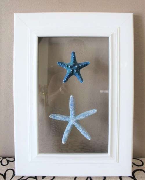 An awesome real "Starfish" on a glass panel in a white frame. Stunning in all homes!!
