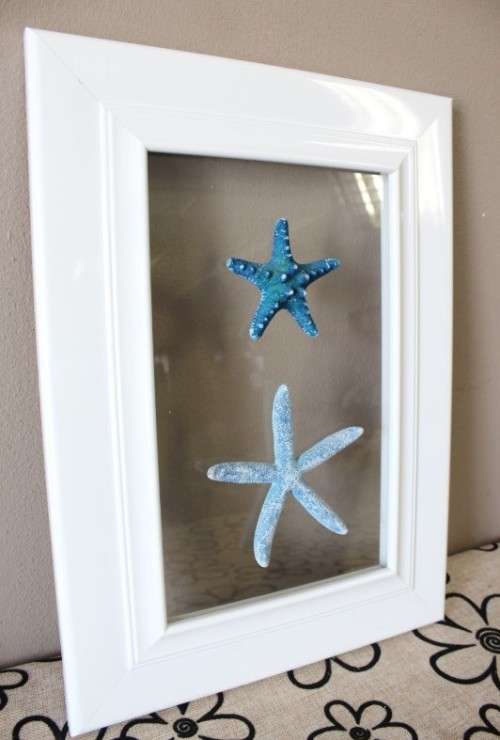 An awesome real "Starfish" on a glass panel in a white frame. Stunning in all homes!!