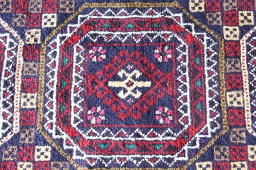 A fabulous vintage hand knotted thick pile Persian carpet (183cm x 91cm ) in good condition