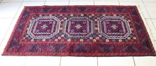 A fabulous vintage hand knotted thick pile Persian carpet (183cm x 91cm ) in good condition