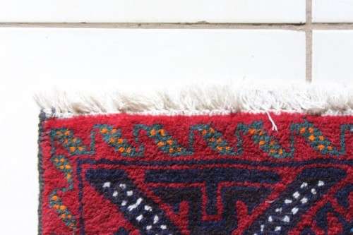 A fabulous vintage hand knotted thick pile Persian carpet (183cm x 91cm ) in good condition