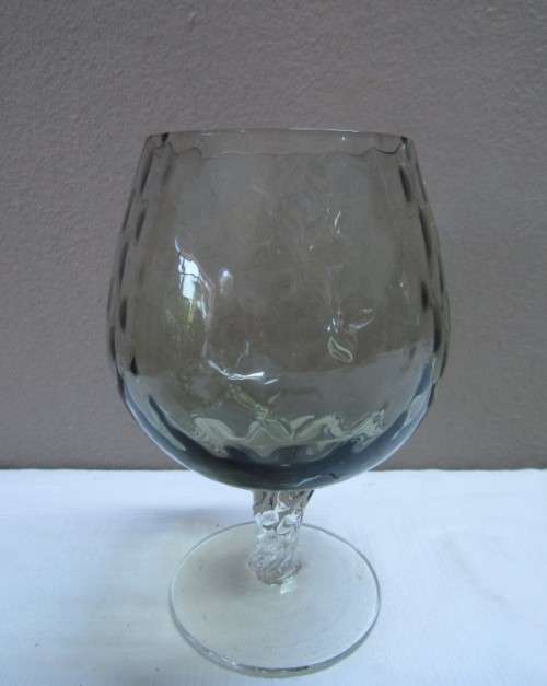 A fabulous set of 3 coloured glasses in different shapes and sizes!! Lovely on a summer table.
