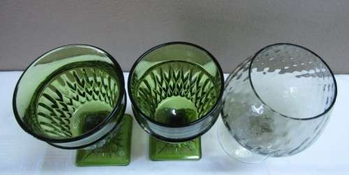 A fabulous set of 3 coloured glasses in different shapes and sizes!! Lovely on a summer table.