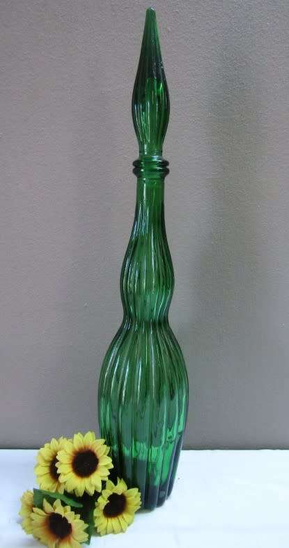 A fabulous emerald green retro Genie bottle/decanter!! Lovely for serving wine on a summer table.