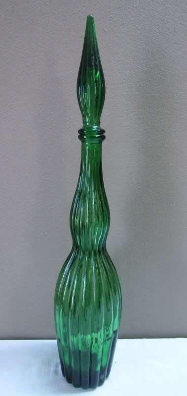 A fabulous emerald green retro Genie bottle/decanter!! Lovely for serving wine on a summer table.