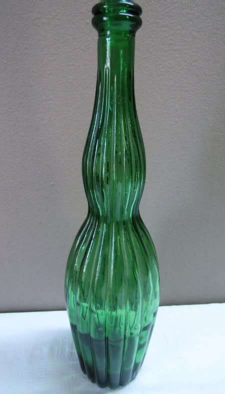 A fabulous emerald green retro Genie bottle/decanter!! Lovely for serving wine on a summer table.