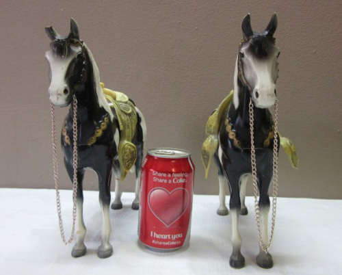 A lovely pair of plastic figurines of horses, fabulous on display.