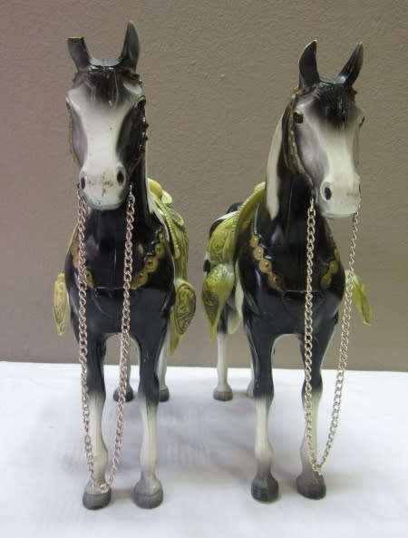 A lovely pair of plastic figurines of horses, fabulous on display.