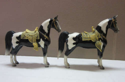 A lovely pair of plastic figurines of horses, fabulous on display.