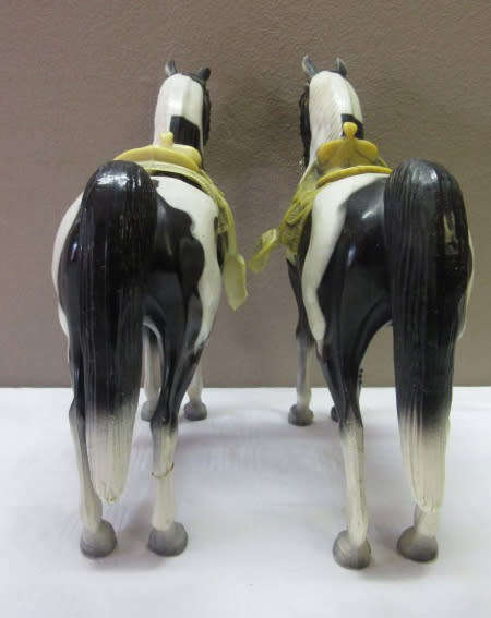 A lovely pair of plastic figurines of horses, fabulous on display.