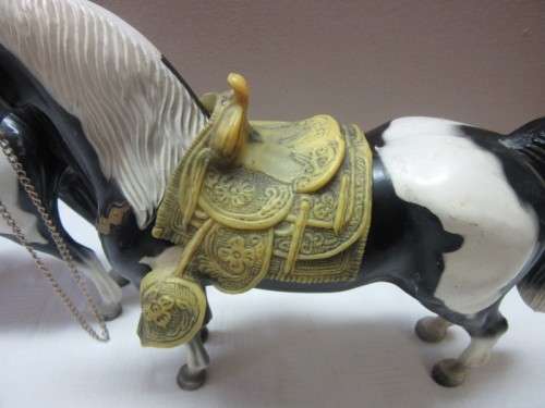 A lovely pair of plastic figurines of horses, fabulous on display.