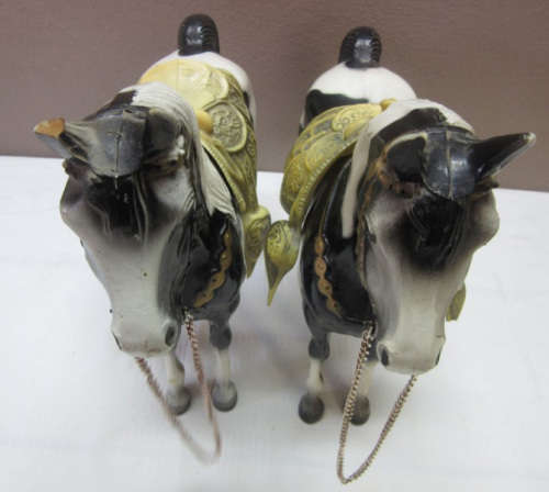 A lovely pair of plastic figurines of horses, fabulous on display.