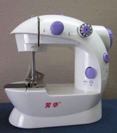 A lovely little mini travelling sewing machine in its original box. Brand new!!!