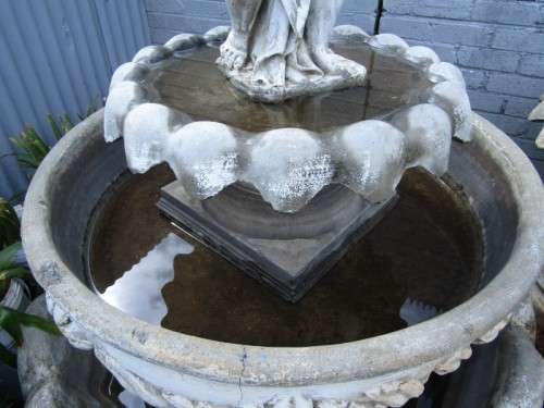 A fabulous, large three tier cherub water fountain. Stunning as a feature piece in a garden!!!