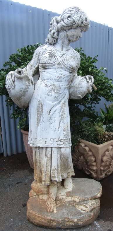 A pretty concrete free standing water feature statue of a lady. Stunning in a fountain or garden!