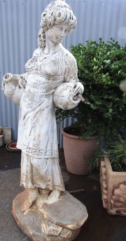 A pretty concrete free standing water feature statue of a lady. Stunning in a fountain or garden!