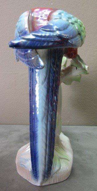 A gorgeous, colourful Jema Holland Parrot wind up clock. Beautiful to brighten up a room.