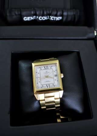 A good-looking original Christina London gold plated Swiss made diamond wrist watch.