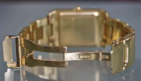 A good-looking original Christina London gold plated Swiss made diamond wrist watch.