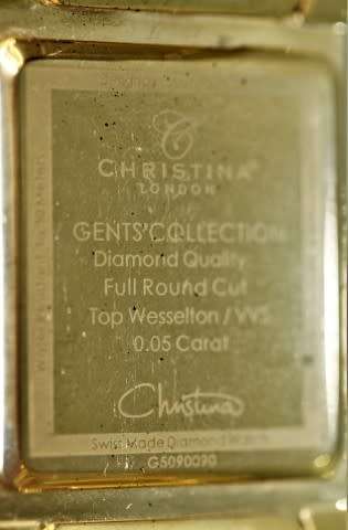 A good-looking original Christina London gold plated Swiss made diamond wrist watch.