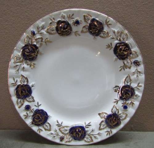 A beautiful Chelsea Royal fine china 24pc dinner set in the Odyssey pattern w/ blue & gold! Stunning