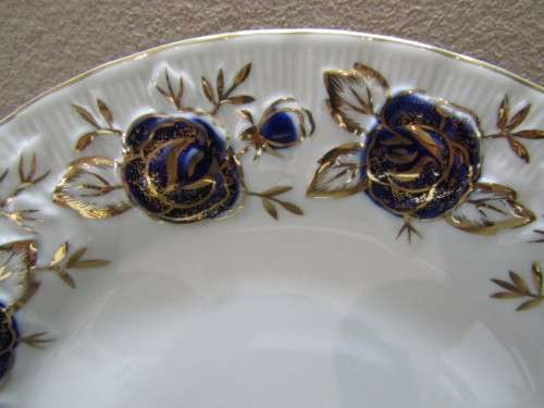 A beautiful Chelsea Royal fine china 24pc dinner set in the Odyssey pattern w/ blue & gold! Stunning