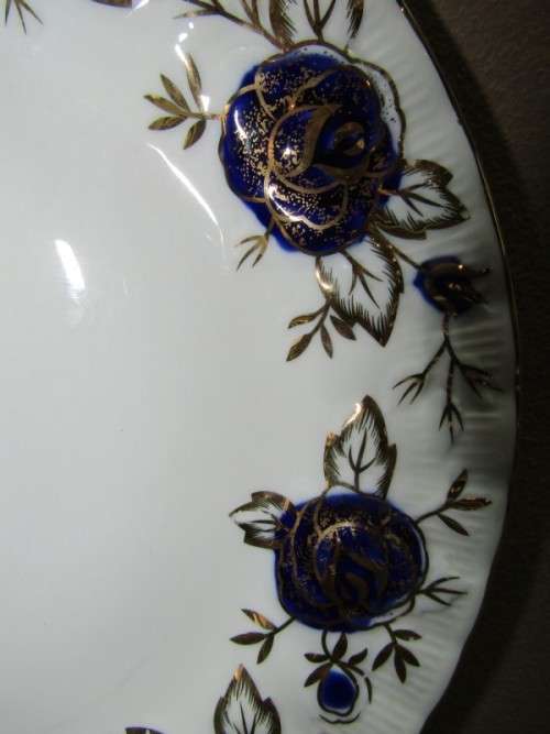 A beautiful Chelsea Royal fine china 24pc dinner set in the Odyssey pattern w/ blue & gold! Stunning