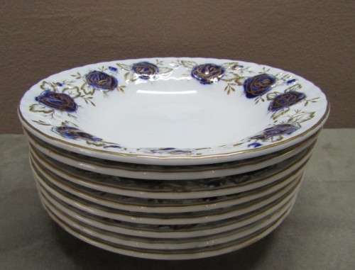 A beautiful Chelsea Royal fine china 24pc dinner set in the Odyssey pattern w/ blue & gold! Stunning