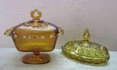 Two lovely lidded coloured glass butter dishes, gorgeous on a breakfast table!