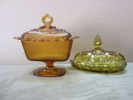 Two lovely lidded coloured glass butter dishes, gorgeous on a breakfast table!