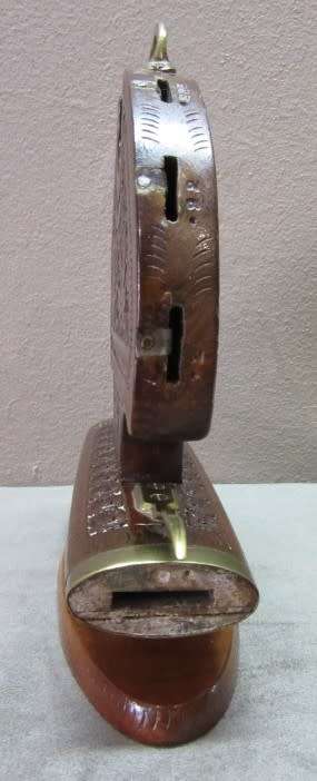 An awesome collectible hand carved Indian knife and fork carving set in a wood stand w/ brass trim