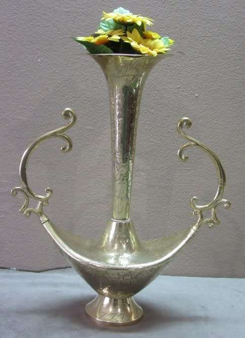 A lovely solid brass vase with two handles. Beautiful on display! Lifespace Sale