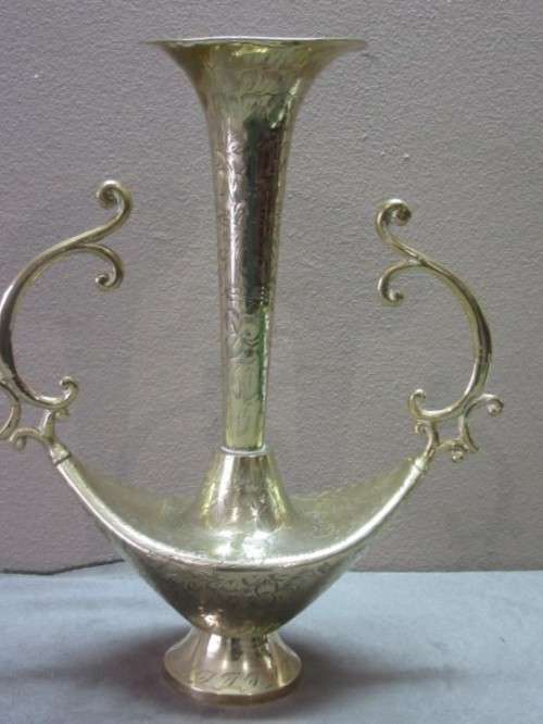 A lovely solid brass vase with two handles. Beautiful on display! Lifespace Sale