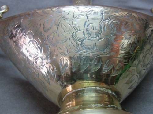 A lovely solid brass vase with two handles. Beautiful on display! Lifespace Sale