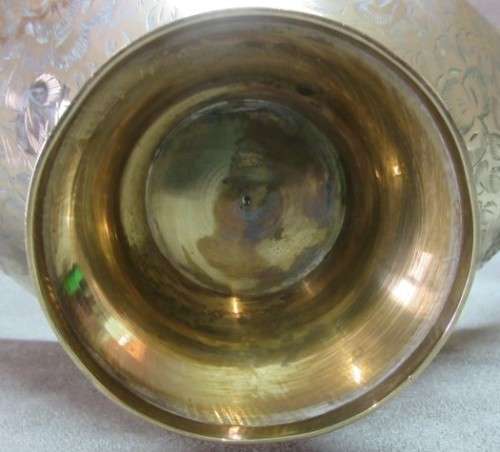 A lovely solid brass vase with two handles. Beautiful on display! Lifespace Sale