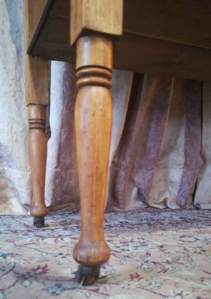 A wonderful vintage solid Oak single door wash stand with a black marble top on castors - stunning!!