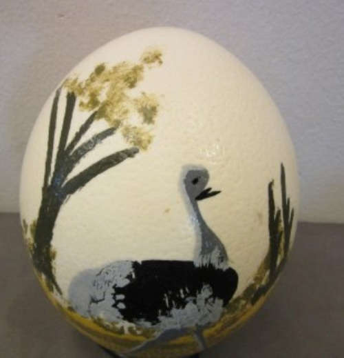 An awesome genuine African ostrich egg with a hand painted Ostrich on. Lovely display piece!!