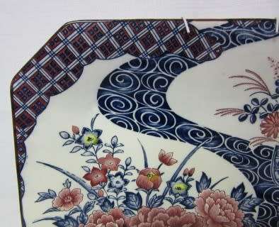 A stunning large rectangular hand painted Japanese "Imari" decorative porcelain wall plate.
