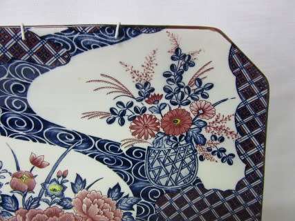 A stunning large rectangular hand painted Japanese "Imari" decorative porcelain wall plate.