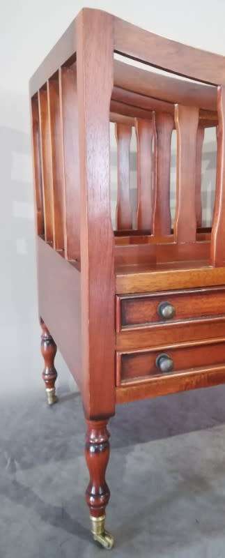 An exquisite vintage solidly made Canterbury magazine rack with 2 drawers on original castors!!