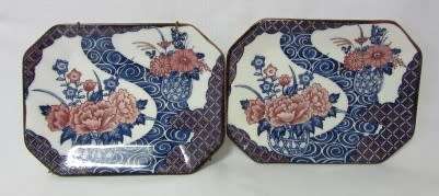 A gorgeous pair of hand painted Japanese "Imari" decorative porcelain wall plates.