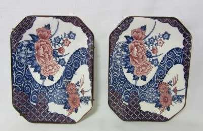 A gorgeous pair of hand painted Japanese "Imari" decorative porcelain wall plates.
