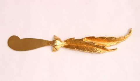 An exquisite Janis collection by Tancraft 24 KT. gold plated set of six butter knives, in its casing