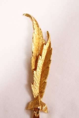 An exquisite Janis collection by Tancraft 24 KT. gold plated set of six butter knives, in its casing