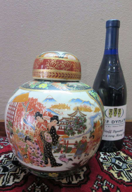 A gorgeous, colourful decorated Japanese Ginger jar with gold gilt on.