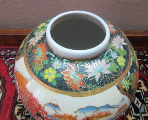 A gorgeous, colourful decorated Japanese Ginger jar with gold gilt on.
