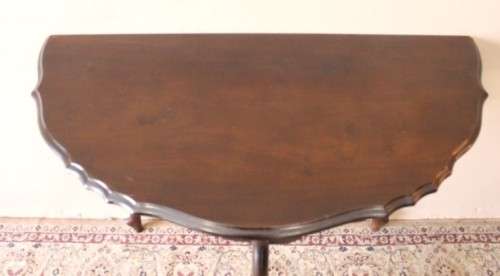 A stylish vintage Imbuia scalloped edge half moon display/ occasional table.