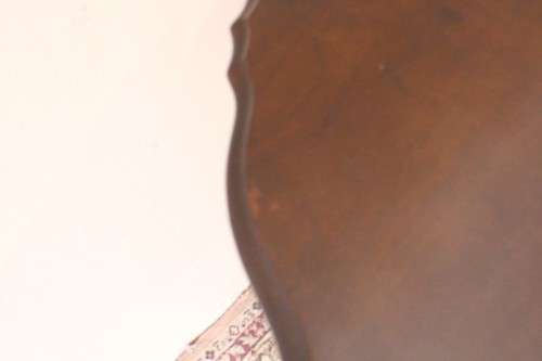 A stylish vintage Imbuia scalloped edge half moon display/ occasional table.