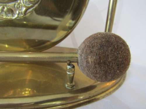 A stunning vintage brass dinner gong on a stand with a mallet, lovely on display or for use!